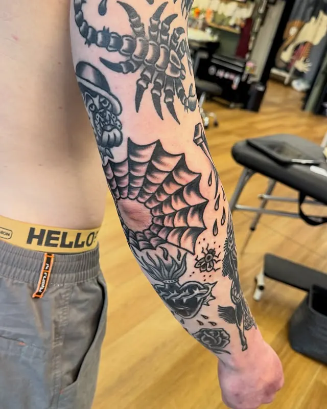 Elbow tattoo with web design and gap fillers